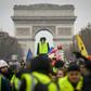 Hundreds of 'yellow vest' protesters took to the Champs-Elysees on Saturday