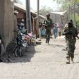 Nigerian soldiers comb a Borno town.