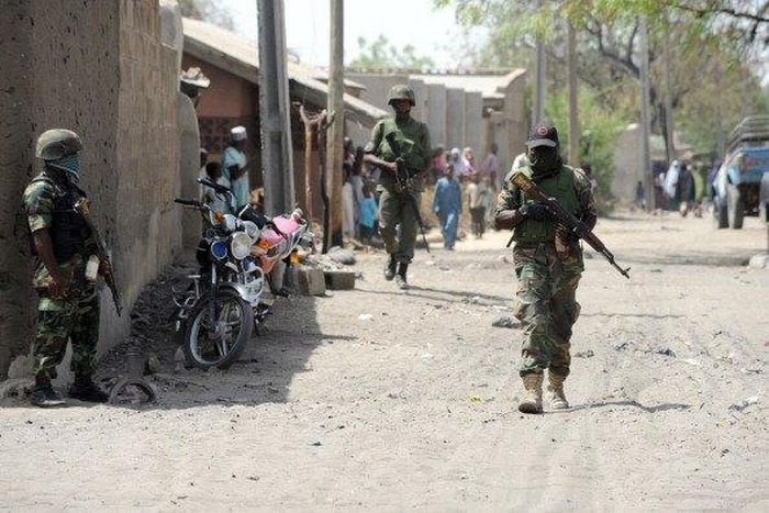 Nigerian soldiers comb a Borno town.