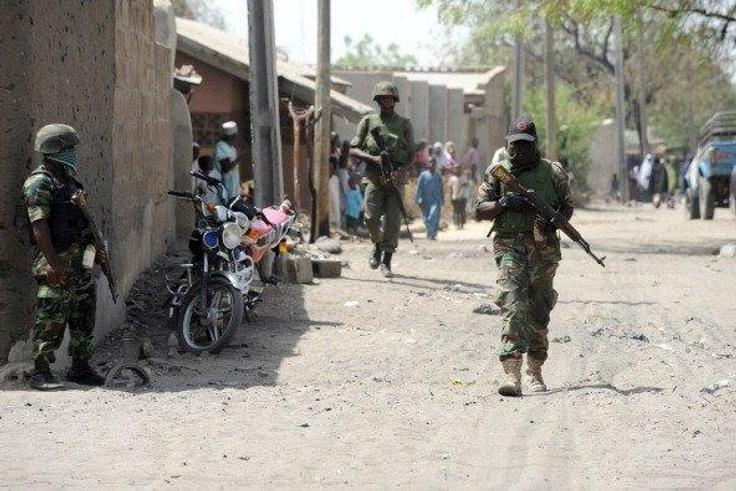 Nigerian soldiers comb a Borno town.