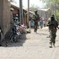 Nigerian soldiers comb a Borno town.