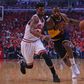 Chicago, IL, USA; Cleveland Cavaliers forward LeBron James (23) dribbles the ball as Chicago Bulls guard Jimmy Butler (21) defends in the first quarter of game four of the second round of the NBA Playoffs at the United Center. Mandatory Credit: Dennis ...