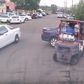Workers moving illegally parked car with a forklift!