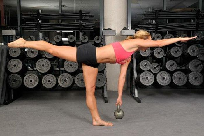 woman-using-kettlebell