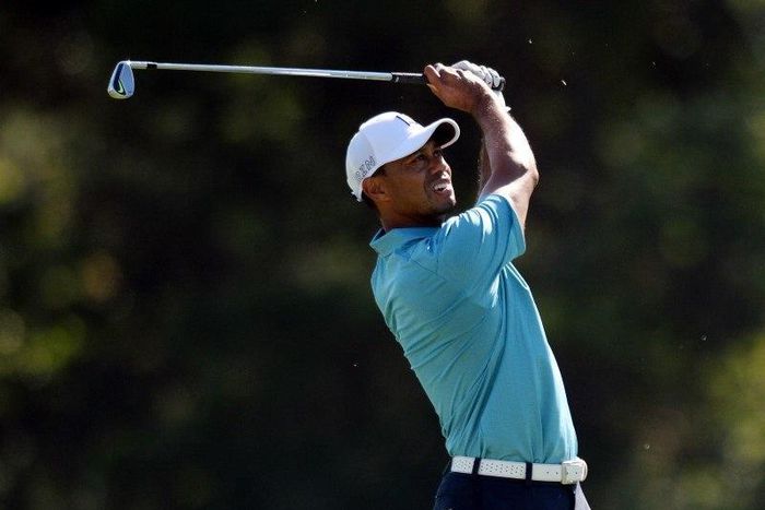 May 8, 2015; Ponte Vedra Beach, FL, USA; Tiger Woods plays a shot on the 14th hole during the second round of The Players Championship golf tournament at TPC Sawgrass - Stadium Course. Jake Roth-USA TODAY Sports