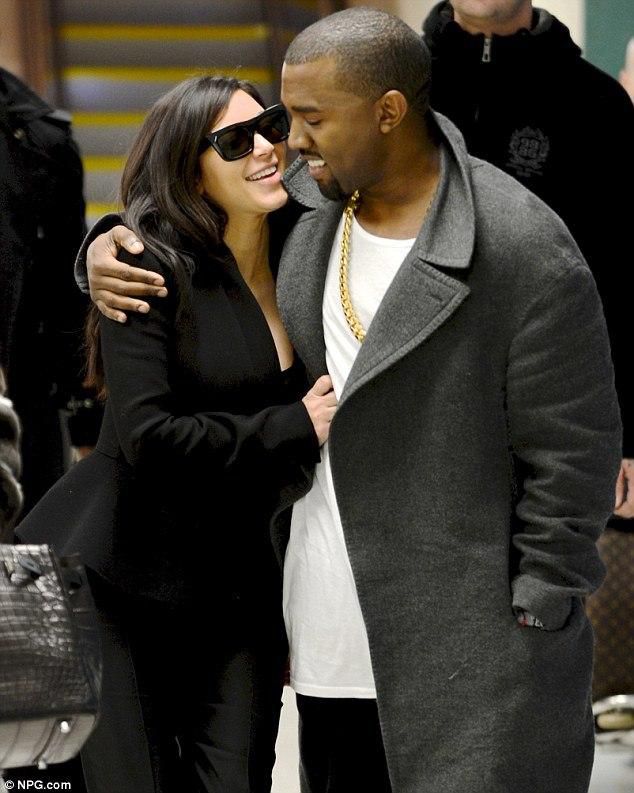 Kim Kardashian and Kanye West loved up