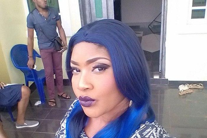 Nollywood actress, Angela Okorie, rocking blue hair