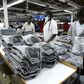 Kenyan workers pack clothes for export at the Alltex export processing zone (EPZ) factory in Athi River, near the Kenyan capital Nairobi, July 31, 2009. REUTERS/Thomas Mukoya