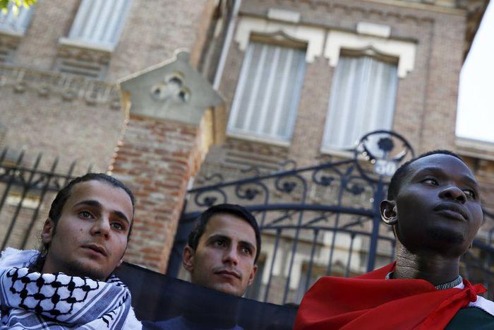Refugees take part in a protest in Madrid, Spain, July 21, 2015. The European Union failed on Monday to agree on how to spread 40,000 asylum seekers in Greece and Italy among its members over the next two years, postponing the decision until the end of...