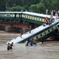 Sabotage suspected as Pakistan troop train plunges into canal, killing 12