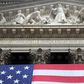 The American flag hangs outside the New York Stock Exchange, July 6, 2015
