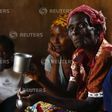 HIV-positive members of a self-help group meet with a caregiver in the village of Michelo, south of the Chikuni Mission in the south of Zambia February 23, 2015. REUTERS/Darrin Zammit Lupi