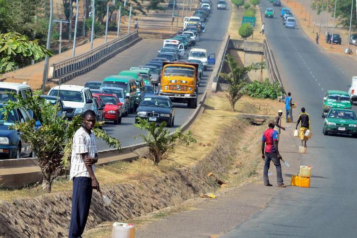 Petrol black market sellers await buyers in Ogun State.