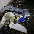 Debris of an helicopter is washed ashore Lagos Lagoon after it crashed into the lagoon in Oworonsoki district in Lagos, August 12, 2015.   REUTERS/Akintunde Akinleye