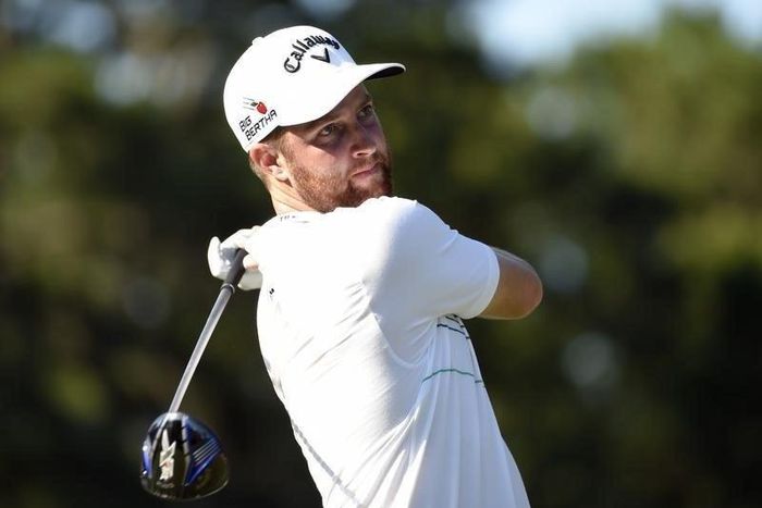 May 9, 2015; Ponte Vedra Beach, FL, USA; Chris Kirk hits his tee shot on the 16th hole during the third round of The Players Championship golf tournament at TPC Sawgrass - Stadium Course. Mandatory Credit: John David Mercer-USA TODAY