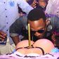 D'Banj savouring his booty on a G-string inspired birthday cake