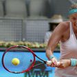 Czech Republic's Petra Kvitova returns the ball to Svetlana Kuznetsova of Russia during their final match at the Madrid Open tennis tournament in Madrid, Spain, May 9, 2015. REUTERS/Andrea Comas