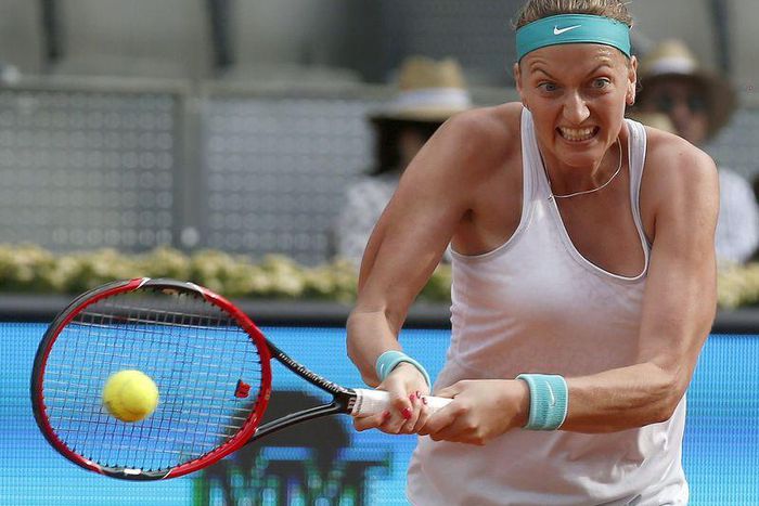 Czech Republic's Petra Kvitova returns the ball to Svetlana Kuznetsova of Russia during their final match at the Madrid Open tennis tournament in Madrid, Spain, May 9, 2015. REUTERS/Andrea Comas