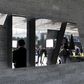 Journalists are reflected in the FIFA logo as they wait for a news conference after a meeting of the FIFA executive committee in Zurich March 20, 2015. REUTERS/Arnd Wiegmann