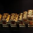 Gold bars are stacked at a safe deposit room of the ProAurum gold house in Munich March 6, 2014. REUTERS/Michael Dalder
