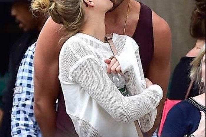Chandler Parsons enjoy a quick kiss with Toni Garrn