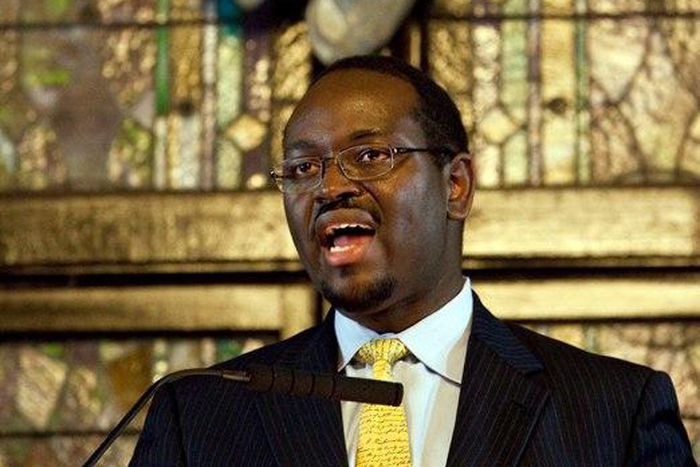 Senior Pastor, Rev. Clementa Pinckney, speaks to those gathered during the Watch Night service at Emanuel African Methodist Episcopal Church in Charleston, South Carolina on December 31, 2012.