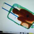 X-ray image of boy hidden in a box