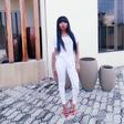 Mocheddah wears bold red lips
