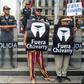People hold up posters saying 'Chavarry Out' during a protest against Peru's attorney general in Lima on January 8, 2019, before he stepped down
