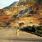 A Malagasy worker walks along an access track at mining giant Rio Tinto's project to construct an ilmenite (iron titanium oxide) mine in Fort Dauphin on Madagascar's south-eastern coast in this file photo. REUTERS/Ed Harris/Files
