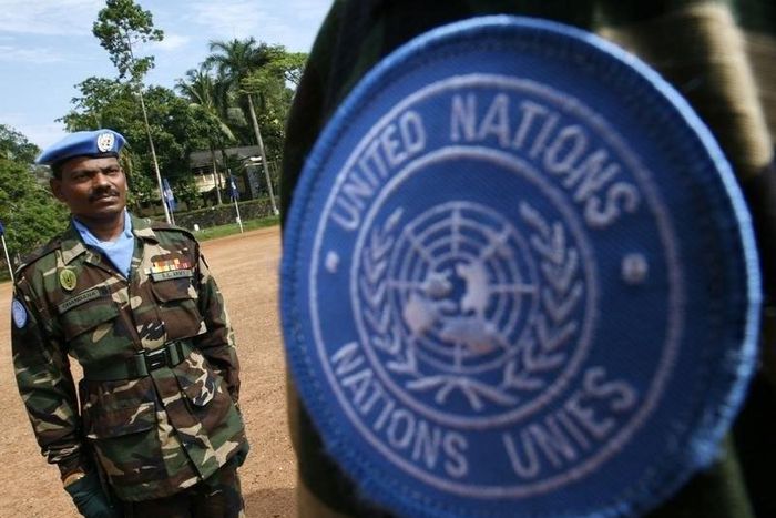 Sri Lankan Army soldiers march during a passing out ceremony before departing for Haiti as U.N. peacekeepers, at Panagoda army base, about 45 km (28 miles) from Colombo, December 23, 2009. REUTERS/Stringer