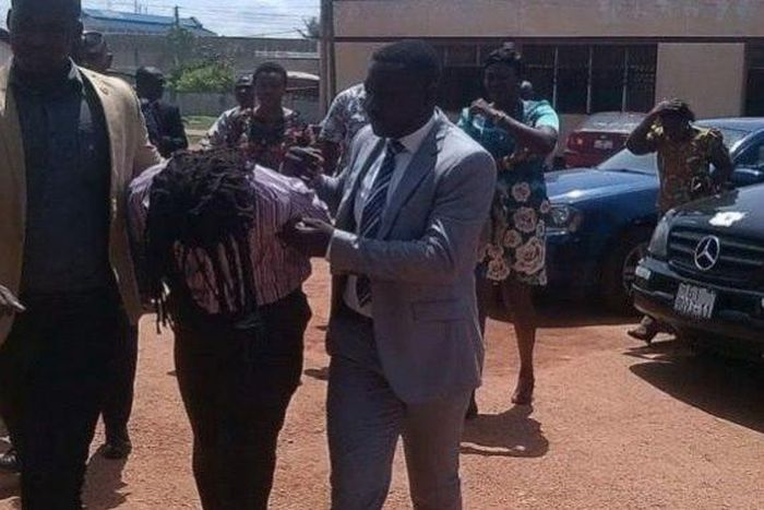 Gregory Afoko a.k.a Rasta (in the middle)