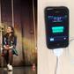 Left: The play continued after the disruption. Right: The iPhone the man tried to charge.