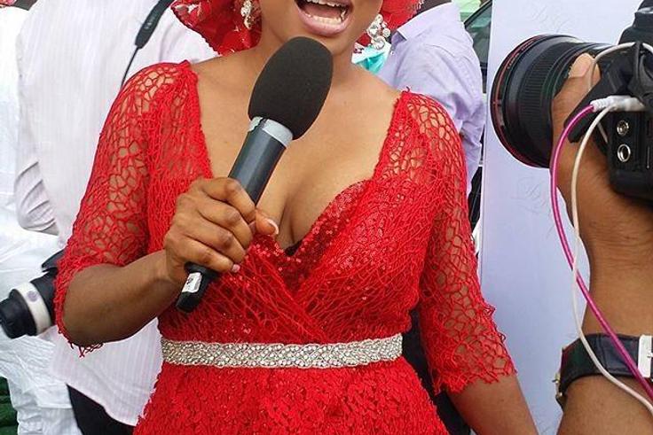 Toke Makinwa looking stunning in her red Aso Ebi