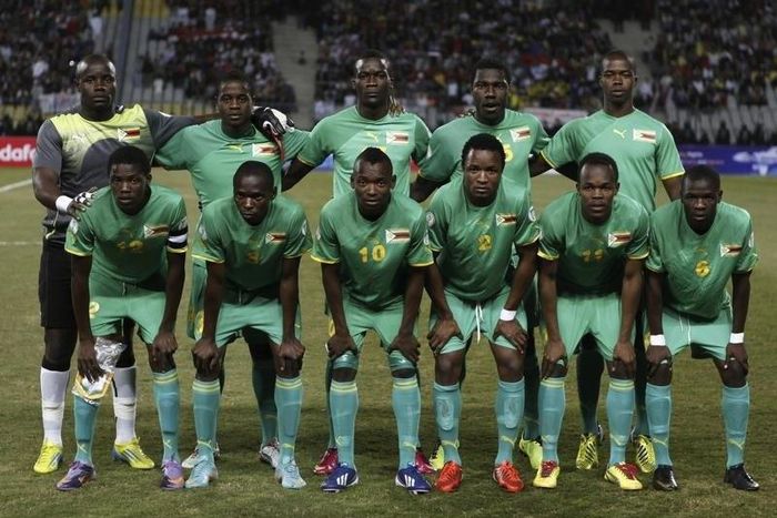 Zimbabwe's players pose before 2014 World Cup qualifying soccer match against Egypt at Borg El Arab "Army Stadium", west of the Mediterranean city of Alexandria, 230 km (143 miles) north of Cairo, March 26, 2013. REUTERS/Amr Abdallah Dalsh