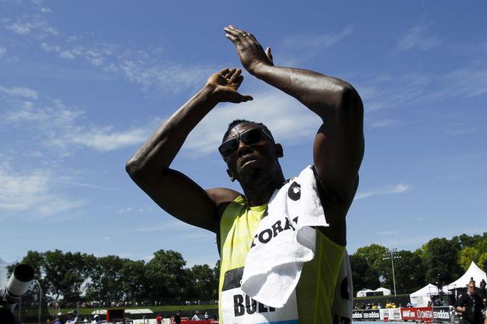 Usain Bolt of Jamaica celebrates after winning the 200m at the IAAF Diamond League Grand Prix track and field competition in New York June 13, 2015. REUTERS/Eduardo Munoz