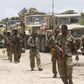 Somalia's army soldiers make their way to the town of Barawe during the second phase of Operation Indian Ocean October 5, 2014. REUTERS/Feisal Omar