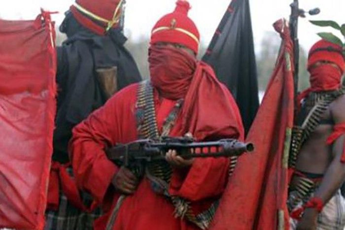 The gunmen took the woman in from of her children.