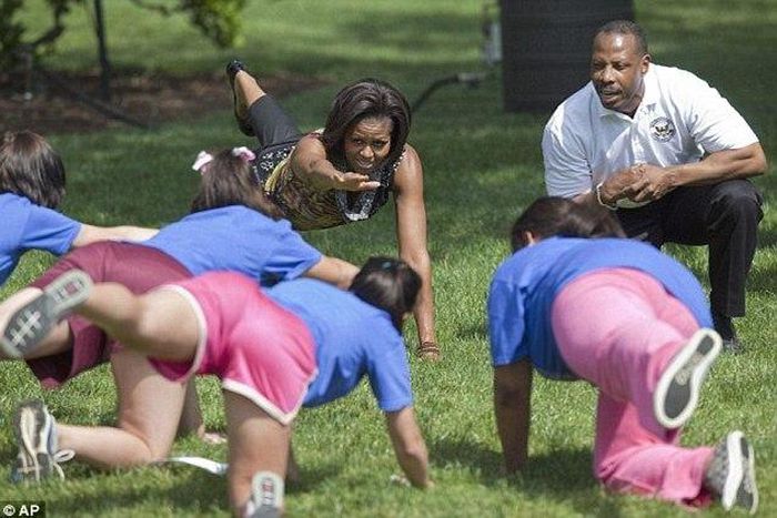 Michelle Obama working out with others