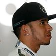 Mercedes Formula One driver Lewis Hamilton of Britain looks on during the second free practice of the Spanish Grand Prix at the Circuit de Barcelona-Catalunya racetrack in Montmelo, near Barcelona, Spain, May 8, 2015. REUTERS/Albert Gea
