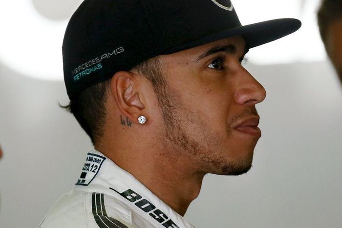 Mercedes Formula One driver Lewis Hamilton of Britain looks on during the second free practice of the Spanish Grand Prix at the Circuit de Barcelona-Catalunya racetrack in Montmelo, near Barcelona, Spain, May 8, 2015. REUTERS/Albert Gea