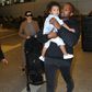 Kanye West arrives LAX with Kim Kardashian and North West