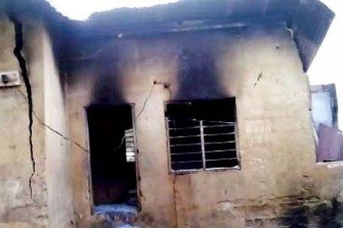 The burnt building where the toddler died.