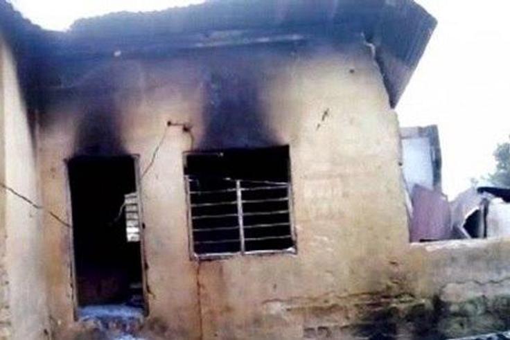 The burnt building where the toddler died.