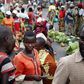 Boys look on as they sell bananas in an open market in a village near Bujumbura, June 1, 2015. REUTERS/Goran Tomasevic