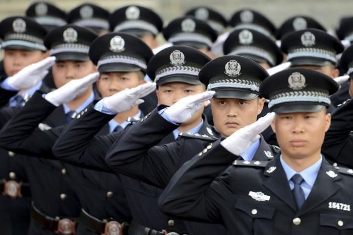 China calls on police to use guns lawfully after shootings