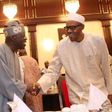 President Buhari and Bola Tinubu exchange pleasantries at the Villa on July 14, where the President hosted APC members.