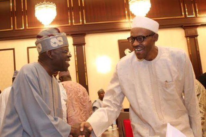 President Buhari and Bola Tinubu exchange pleasantries at the Villa on July 14, where the President hosted APC members.