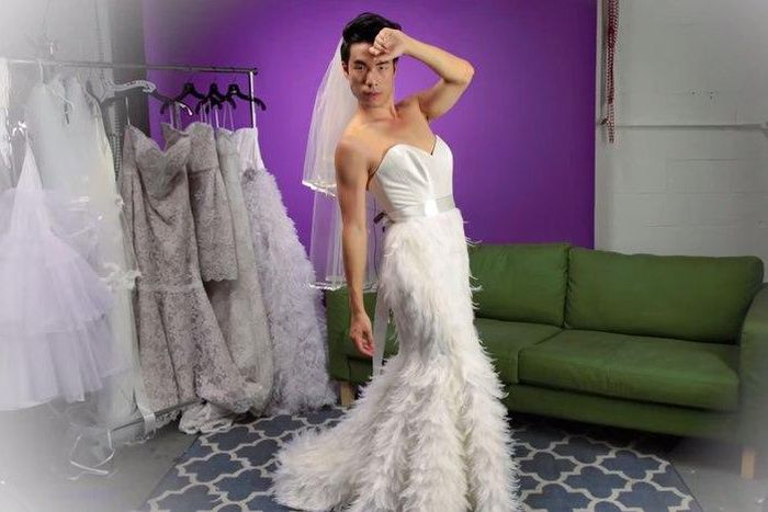 Eugene in a couture gown with a feathered skirt