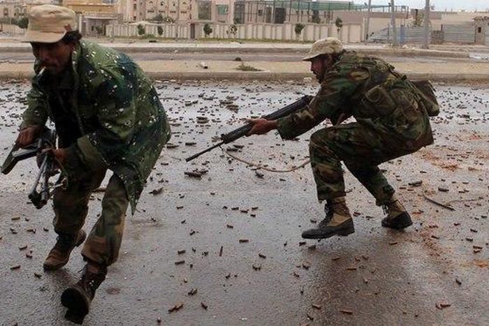 Anti-Qaddafi soldiers in Surt, Libya, the hometown of Col. Muammar el-Qaddafi, the deposed leader. The fighting poses a risk to civilians.